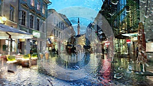 Rainy Evening In Old Town of Tallinn, Estoni travel to Europe, people walking on the street under umbrellas