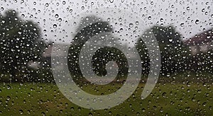 Rainy Forest Cabin with Glowing Interior Lights