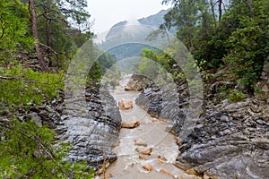 Rainy landscape with mountain river in Goynuk Canyon