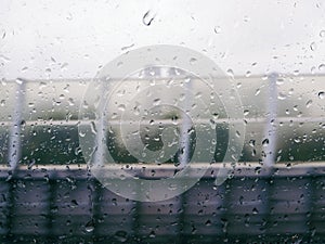 Rainy morning, car window, raindrops, train