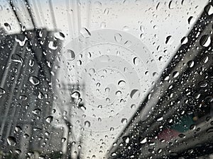 Raindrops on the windshield can impair visibility. photo