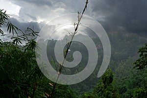 During the rainy season, thick green hills are mixed with thick black clouds in the sky. Hilly region of Bandarban district of