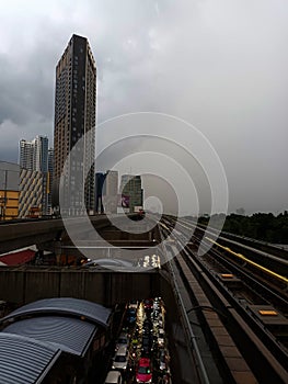 Rainy skies and railroad tracks.