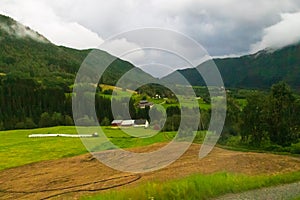 Rainy summer day landscape Myrkdalen Vossestrand Norway