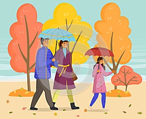 Rainy weather, father, mother, daughter with umbrella walking in autumn park together, enjoy nature