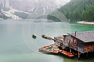 Rainy weather at Lago di Braies. Summer cloudy day.