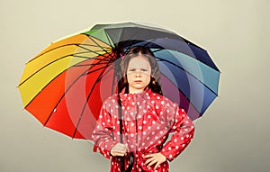 Rainy weather with proper garments. Rainy day fun. Happy walk under umbrella. There is rainbow always after the rain