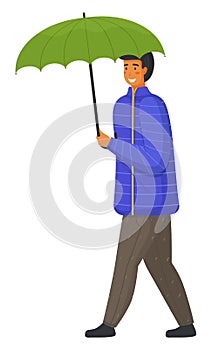 Rainy weather, young smiling man with umbrella isolated at white background, guy wear warm clothes