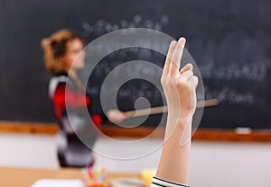 Raised arm in math class