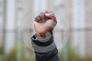 Raised black man fist in protest