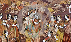 Raised crafted Indian Hindu Gods Krishna and Radha on wood, whole background photo