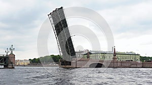 Raised drawbridge span of Trinity bridge across Neva river