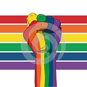 Raised fist painted in rainbow colors on a rainbow colors background. Sticker, patch, t-shirt print, logo design