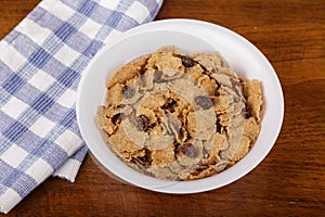 Raisin Bran Cereal in White Bowl