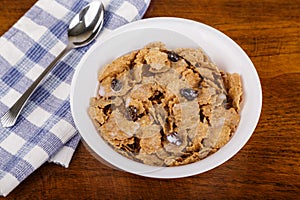 Raisin and Bran Flake Cereal with Milk