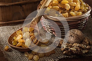 Raisins in a basket and other fruits