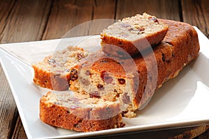 Raisins cake on white plate