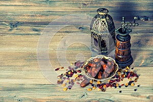 Raisins and dates. Vintage oriental lantern. Retro style toned