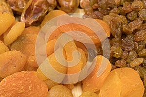 Raisins, dried apricots close-up, Oriental texture sweets