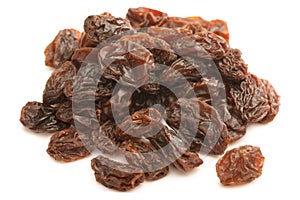 Raisins isolated against white background