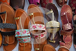 Rajasthani juti handmade from leather colored into beautiful patterns. These are essential wear during events, festivals and