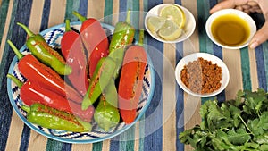 Rajasthani Mirchi Ka Achaar / stuffed chili pickle placed on a colorful background