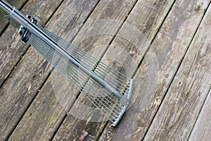 Rake on wood Slat