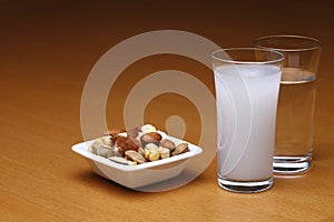 Raki and water with dried fruit