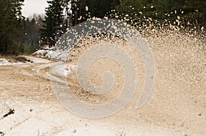 Rally car drifting on the snowy winter road