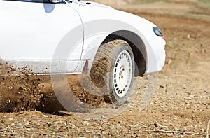 Rally car turning in track