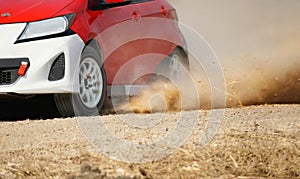 Rally racing car on dirt road