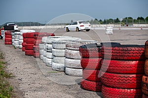 rally track marked with old tires painted red and white