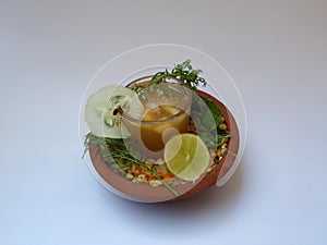 Ram Navami Hindu Festival Food Musk Melon Cool drink, Hesaru Bele with Lemon in a Sand Bowl isolated on White Background