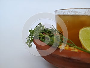 Ram Navami Hindu Festival Food Musk Melon Cool drink, Hesaru Bele with Lemon in a Sand Bowl  on White Background