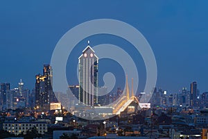 Rama 9 bridge and Kasikorn Building, with skyscraper high rise buildings in urban city, Downtown Bangkok skyline, Thailand at