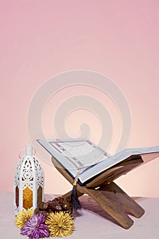 Ramadan background. Rehal with open Quran. Quran open in wooden placemat