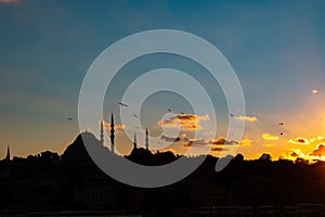 Ramadan concept photo. Suleymaniye Mosque at sunset with partly cloudy sky