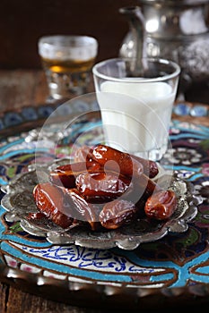 Ramadan food: ripe dates, green tea and fermented milk drink