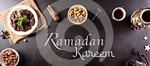 Ramadan Kareem background concept, Rosary bead with dates fruit and milk on dark stone background