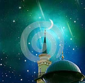 Ramadan Kareem background.Crescent moon at a top of a mosque.Islamic greeting Eid Mubarak cards for Muslim