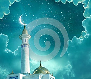Ramadan Kareem background.Crescent moon at a top of a mosque.Islamic greeting Eid Mubarak cards for Muslim