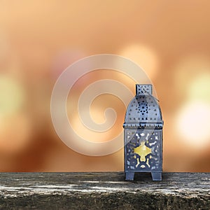 Ramadan Kareem background with Eid lamp or Arabic lantern on gold candle light bokeh for Islamic muslims religious fasting month