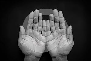 Ramadan kareem concept, Black and white prayer hands open two empty hands with palms up to pray God