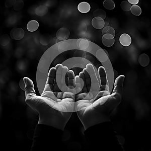 Ramadan kareem concept, Black and white prayer hands open two empty hands with palms up to pray God