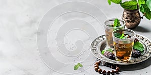 Ramadan Kareem holiday, arabic mint tea with dates fruit