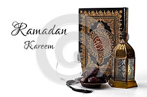 Ramadan Kareem, muslim religious tradition, holy month of Islam and Iftar concept theme with a bowl of dates, prayer beads, glass