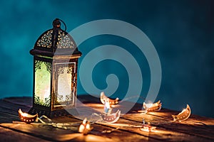Ramadan Lantern with Colorful Light Glowing at Night and Glittering with Bokeh Lights on Ground. Festive Greeting Card, Invitation