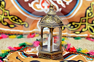 Ramadan Lantern lamp or Fanous Ramadan on a Ramadan background as a festive celebration of the Islamic fasting days in Arabian