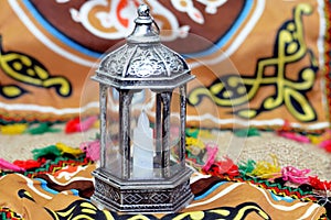 Ramadan Lantern lamp or Fanous Ramadan on a Ramadan background as a festive celebration of the Islamic fasting days in Arabian