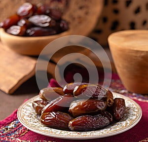 Ramadan theme, plate of dates background